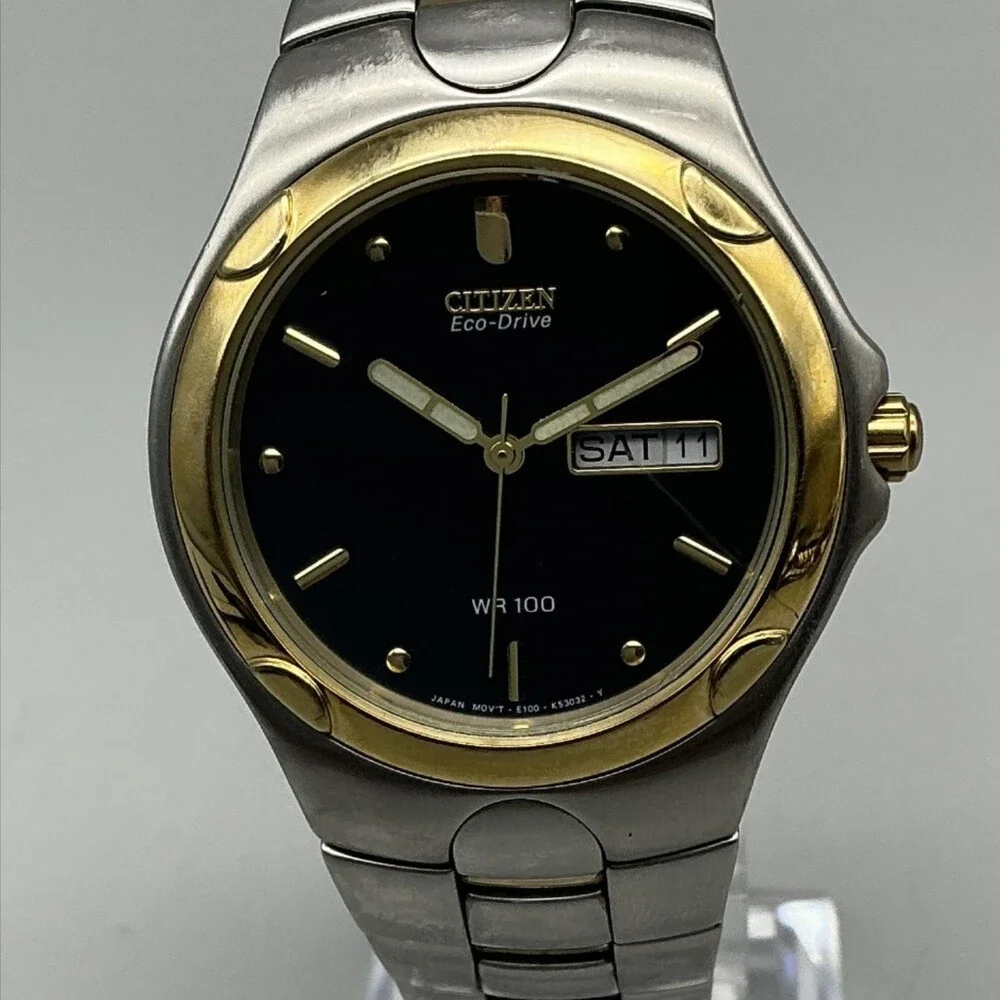 Citizen Eco-Drive E100 Mens Watch 35mm Black Dial Two Tone Day Date 7.25